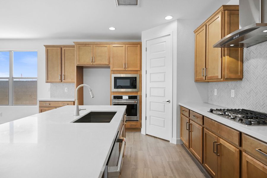 Representative furnished interior of a home built from the Caliber by Taylor Morrison in Artisan at Asante, Surprise (Image 12). Representative furnished interior of a home built from the Caliber by Taylor Morrison in Artisan at Asante, Surprise (Image 12).