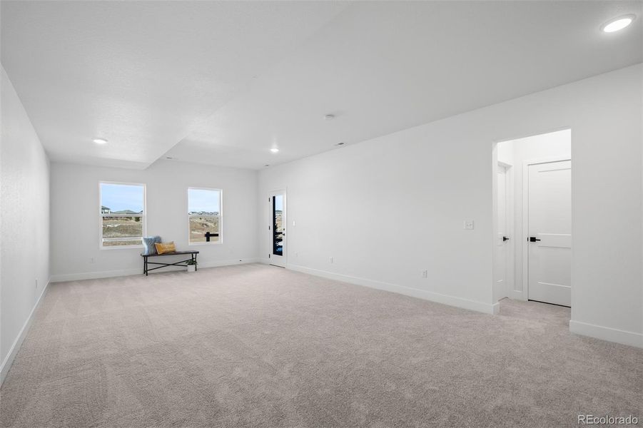 Spacious, unfurnished interior of a new home in Revel Crossing at Wolf Ranch - The Panorama Collection, Colorado Springs (Image 32).