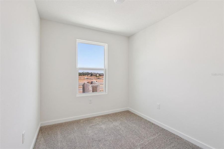 Spacious, unfurnished interior of a new home in Cyrene at Harmony, St. Cloud (Image 25).