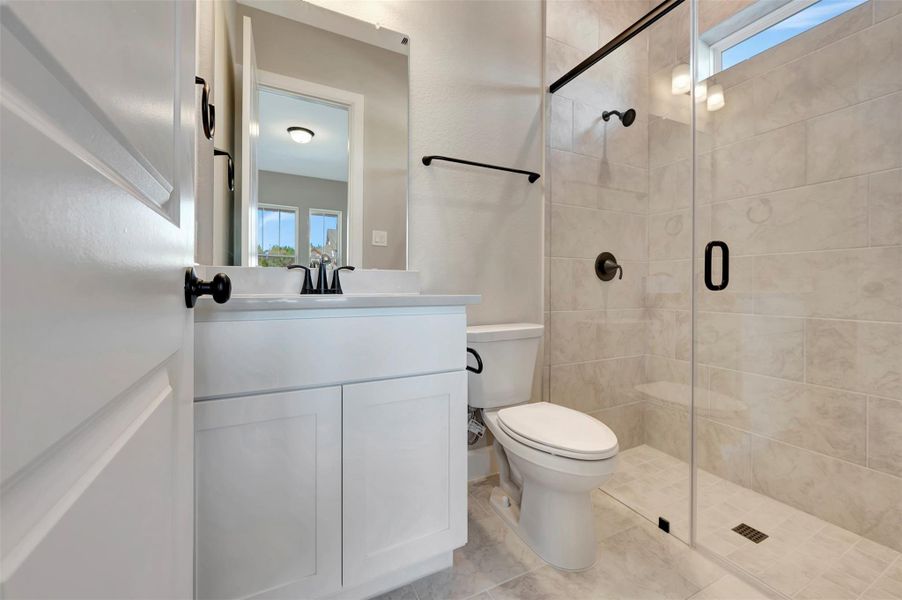 Walk-in shower at ensuite bath at 1st floor guest room is perfect for those that prefer not to have a tub!
