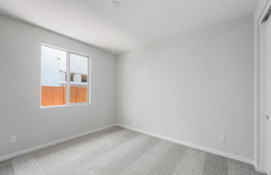 Spacious, unfurnished interior of a new home in Blossom Rock, Apache Junction (Image 18).