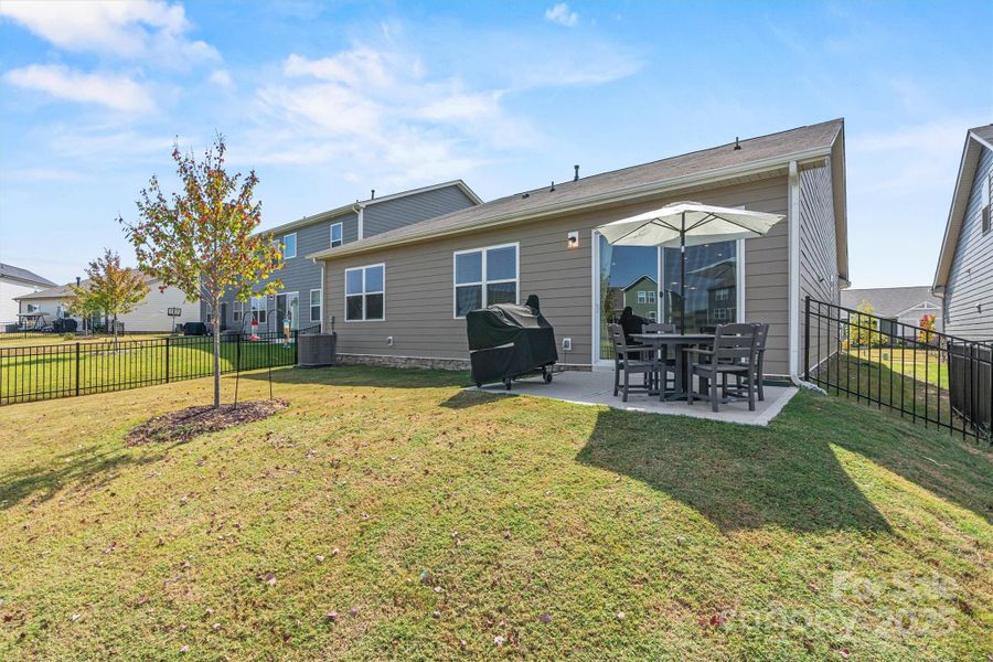 Exterior details and patio area of a home in Waxhaw Landing, Monroe (Image 22).