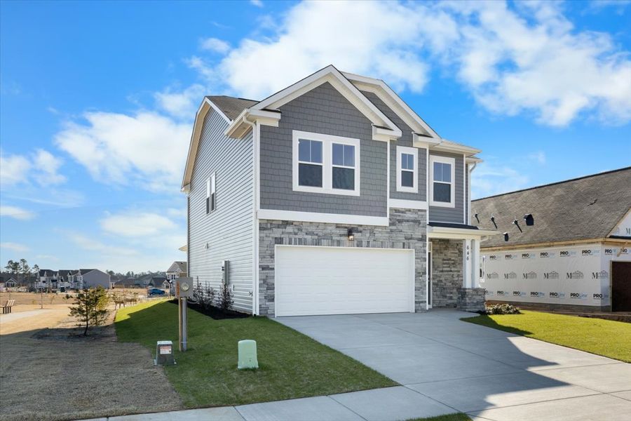 Front exterior of a new home in Windsor, North Augusta, SC, highlighting curb appeal (Image 18).