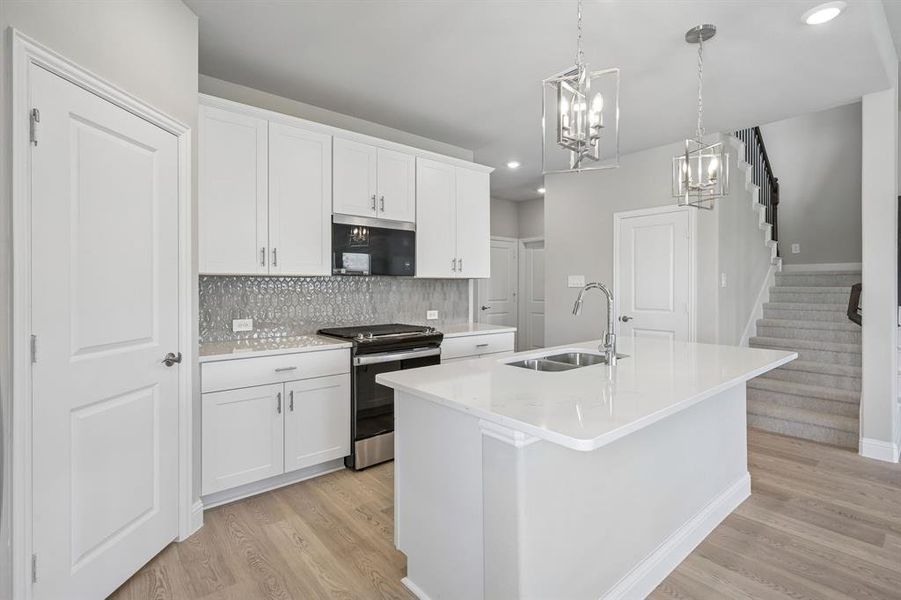 Furnished interior view inside a new home in Lakehaven - Signature Series, Farmersville (Image 13).