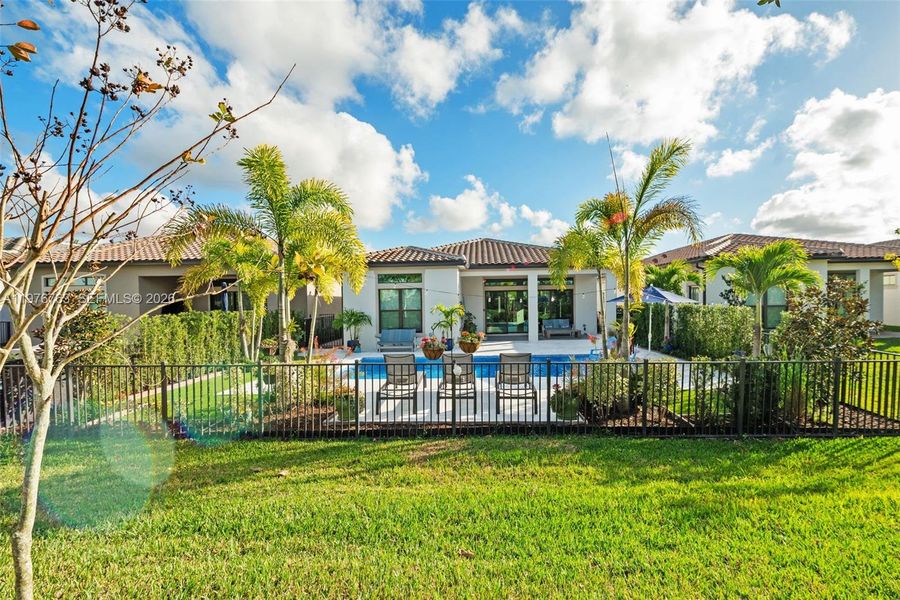Exterior details and patio area of a home in , Parkland (Image 21).