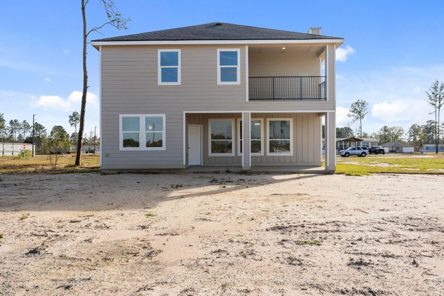 Exterior details and patio area of a home in , Conroe (Image 26).