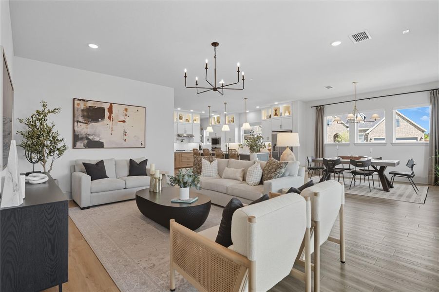 Open floorplan connects kitchen, dining and living areas. Open floorplan connects kitchen, dining and living areas.