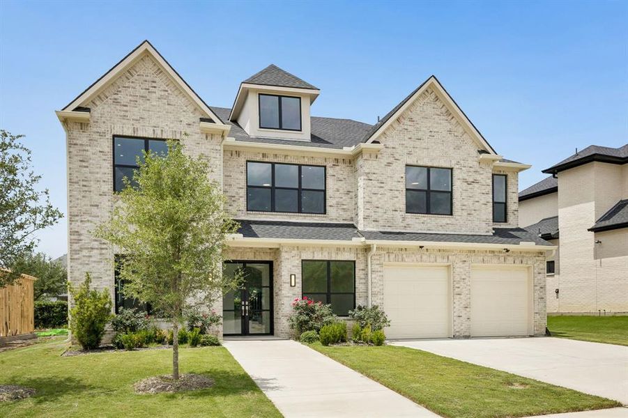 Front exterior of a new home in , Frisco, TX, highlighting curb appeal (Image 2). Front exterior of a new home in , Frisco, TX, highlighting curb appeal (Image 2).