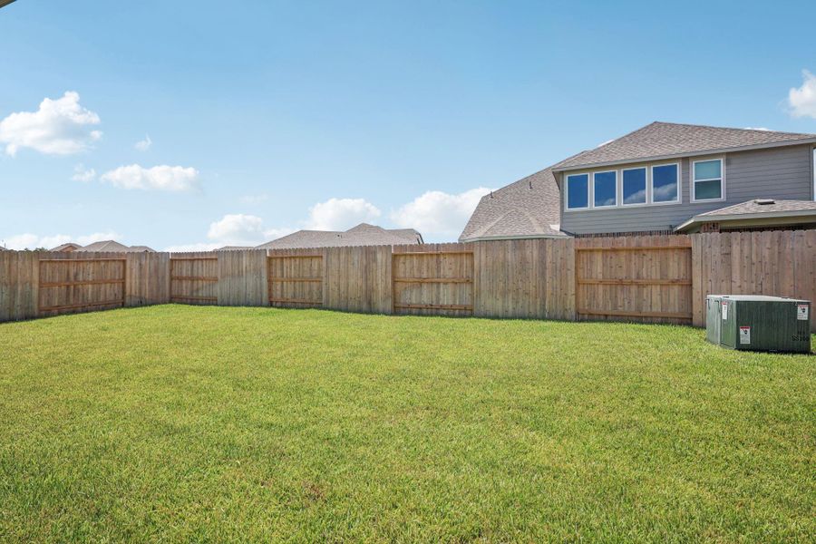 Front exterior of a new home in Kingdom Heights, Rosenberg, TX, highlighting curb appeal (Image 24).