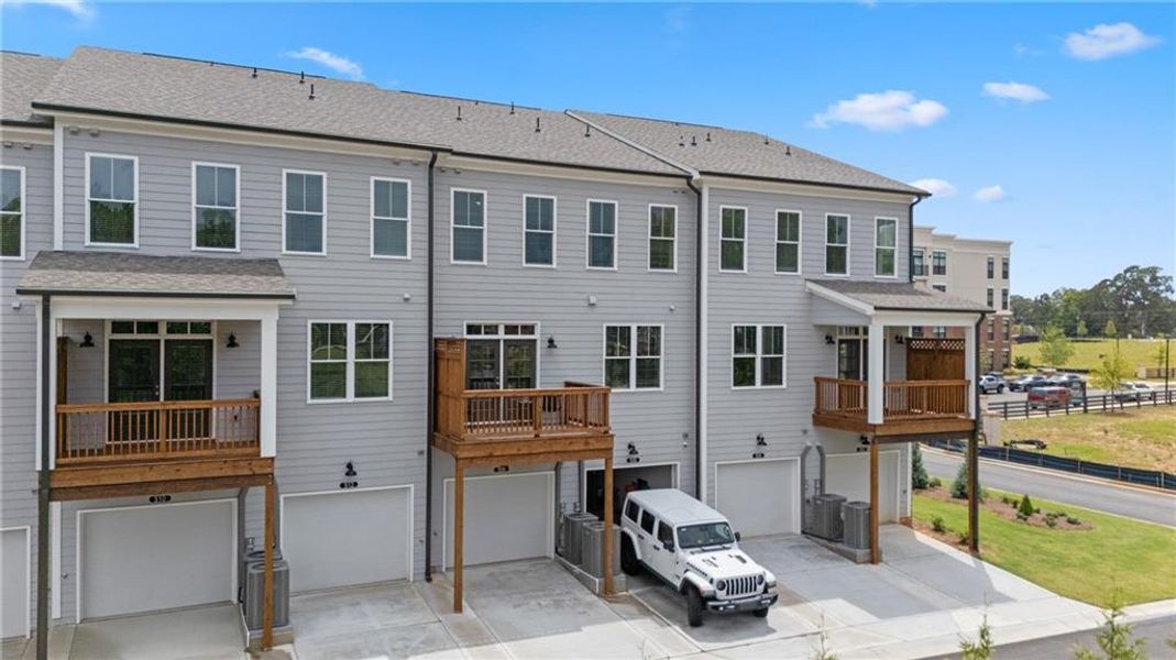 Exterior details and patio area of a home in Market Square at Sawnee Village, Cumming (Image 1). Exterior details and patio area of a home in Market Square at Sawnee Village, Cumming (Image 1).