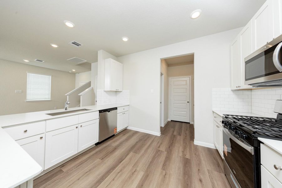 Furnished interior view inside a new home in River's Edge, Conroe (Image 10).