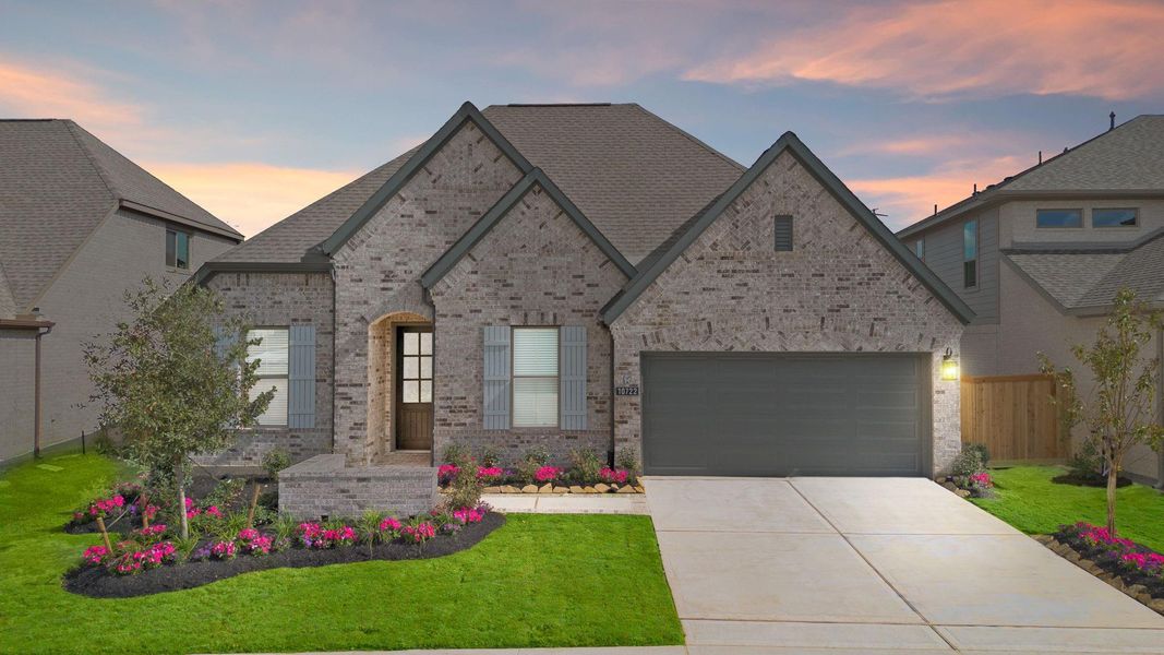 Front exterior of a new home in Bridgeland 55', Cypress, TX, highlighting curb appeal (Image 2).