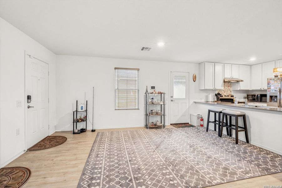 Furnished interior view inside a new home in Tarasco Gardens, San Antonio (Image 8).