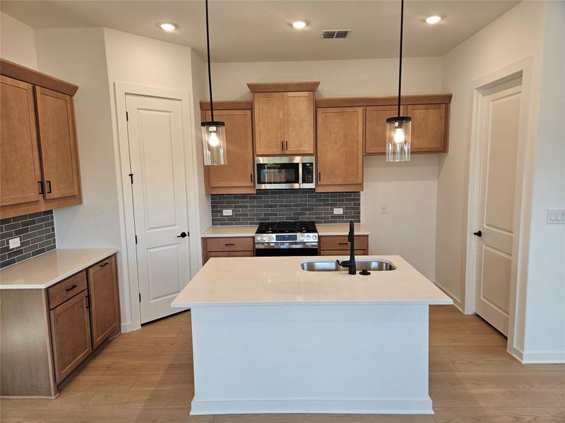 Furnished interior view inside a new home in Estancia West, Manchaca (Image 9). Furnished interior view inside a new home in Estancia West, Manchaca (Image 9).