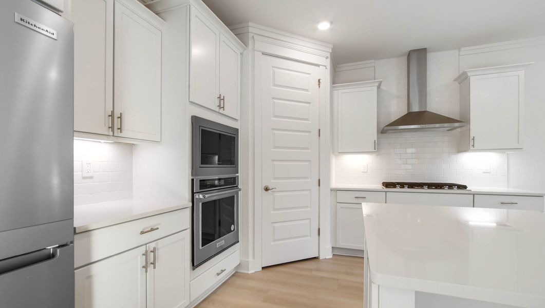Representative furnished interior of a home built from the Ava by D.R. Horton in Parkside, Santa Rosa Beach (Image 8).