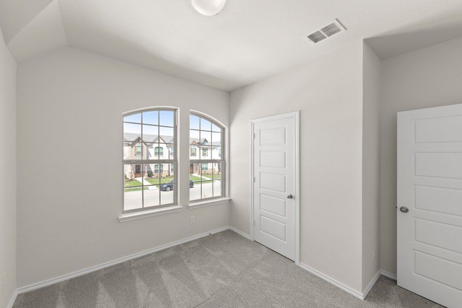 Front exterior of a new home in Sanger Circle, Sanger, TX, highlighting curb appeal (Image 22). Front exterior of a new home in Sanger Circle, Sanger, TX, highlighting curb appeal (Image 22).