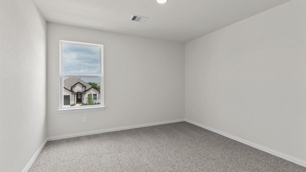 Representative furnished interior of a home built from the Southfork by Brightland Homes in Cielo, Conroe (Image 16).