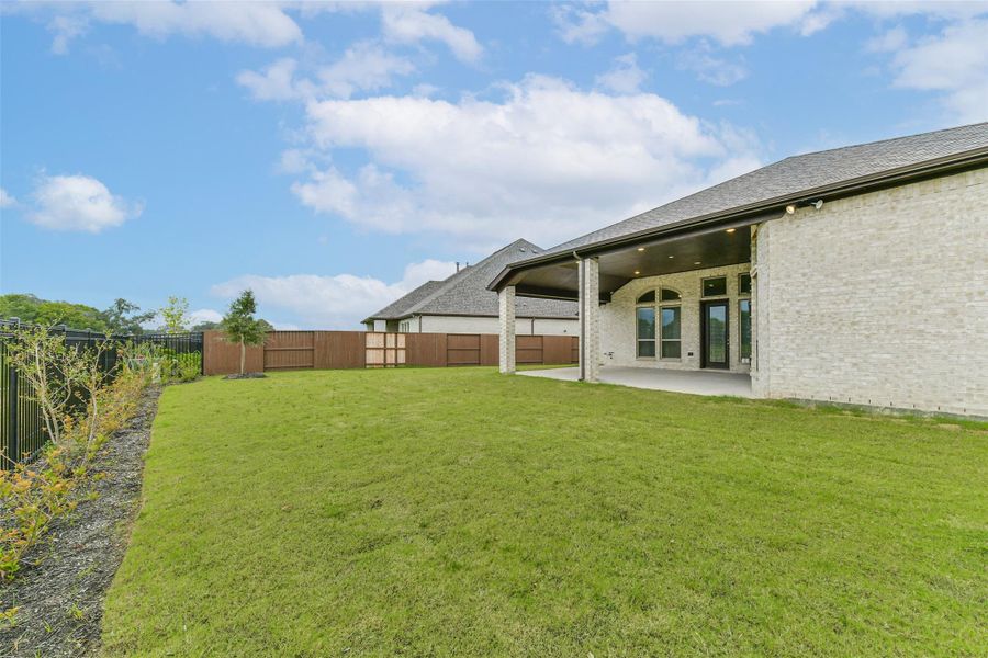 Front exterior of a new home in , Manvel, TX, highlighting curb appeal (Image 23). Front exterior of a new home in , Manvel, TX, highlighting curb appeal (Image 23).