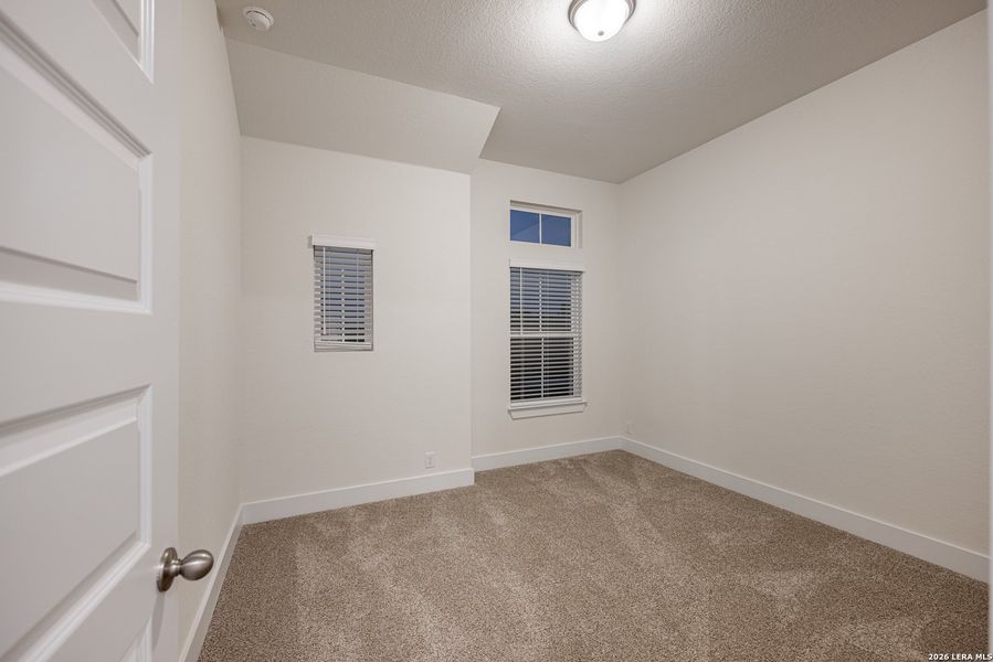 Spacious, unfurnished interior of a new home in The Reserve at Potranco Oaks, Castroville (Image 20).