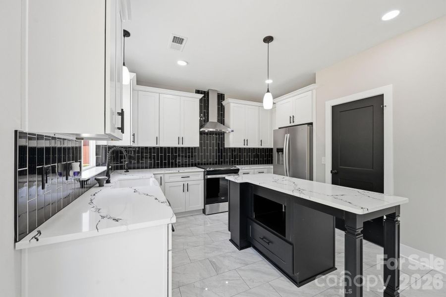 Furnished interior view inside a new home in , Huntersville (Image 7).