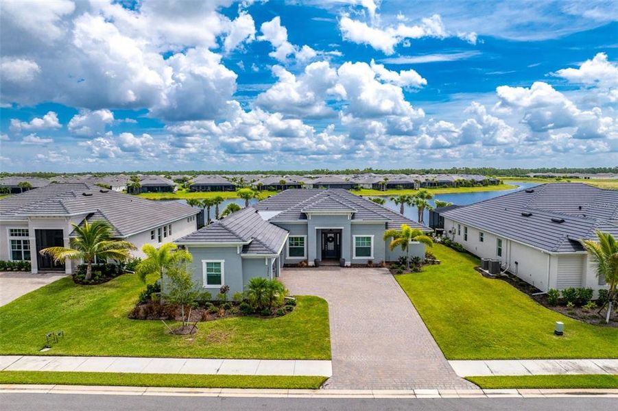 Front exterior of a new home in , Punta Gorda, FL, highlighting curb appeal (Image 24). Front exterior of a new home in , Punta Gorda, FL, highlighting curb appeal (Image 24).