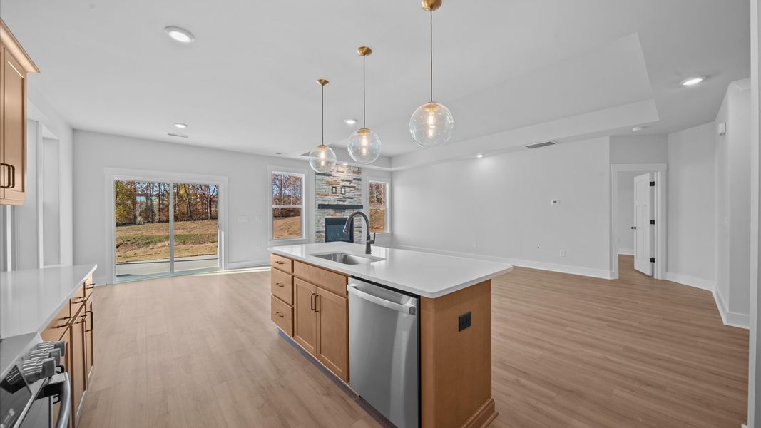 First-class finishes and a thoughtfully scaled island highlight this elegant kitchen space