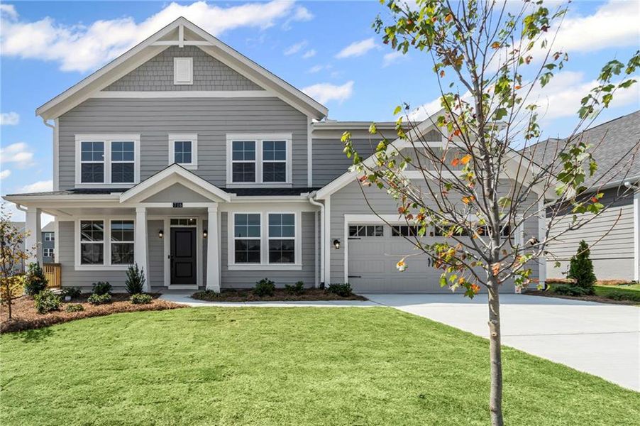 Front exterior of a new home in Twin Lakes, Hoschton, GA, highlighting curb appeal (Image 19). Front exterior of a new home in Twin Lakes, Hoschton, GA, highlighting curb appeal (Image 19).