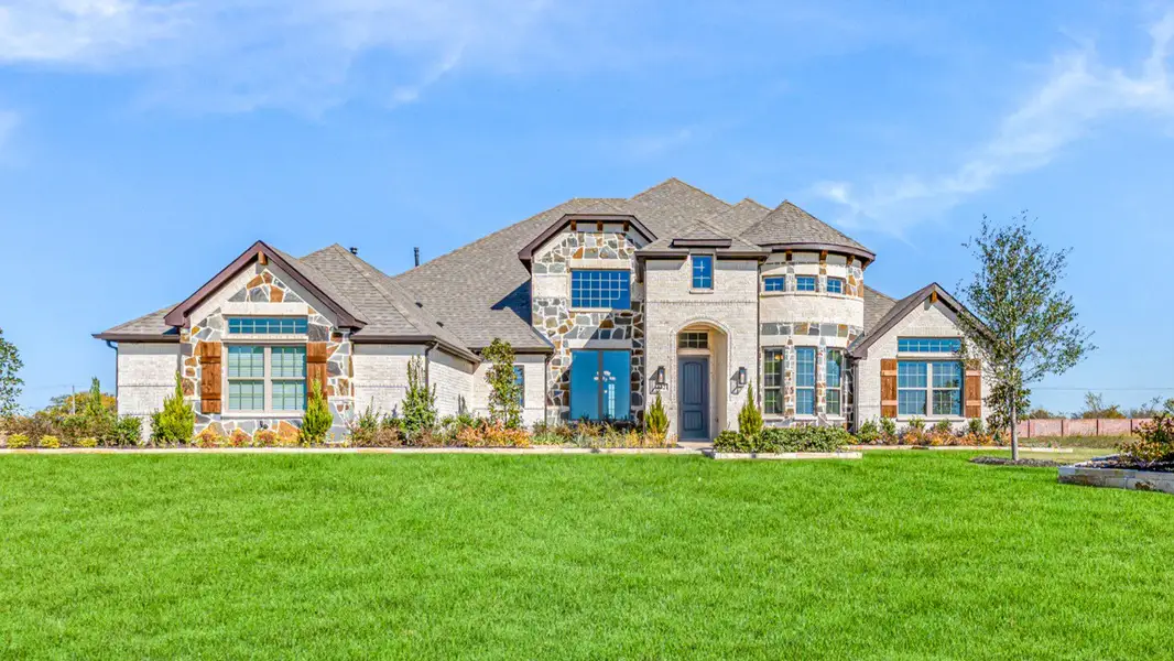 Front exterior of a new home in Levante, Waxahachie, TX, highlighting curb appeal (Image 1). Front exterior of a new home in Levante, Waxahachie, TX, highlighting curb appeal (Image 1).