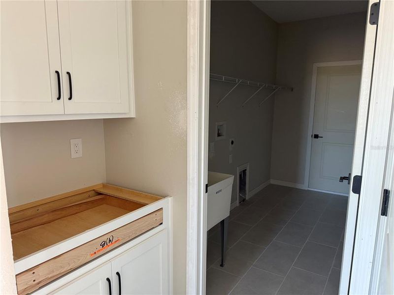 In-progress construction of a new home in Oakfield Trails Traditional, Parrish, FL (Image 22).