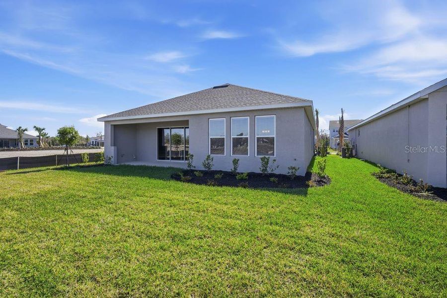 Exterior details and patio area of a home in Firethorn, Parrish (Image 3).