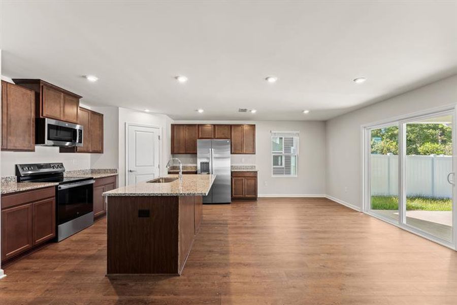 Furnished interior view inside a new home in Bell Creek Single Family Homes, Winnabow (Image 6).