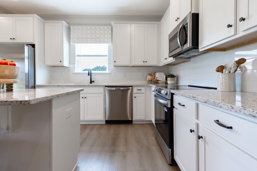 Bradley F with Bonus at Cobblestone Crossing Commons | Kitchen Cabinetry and Island Bradley F with Bonus at Cobblestone Crossing Commons | Kitchen Cabinetry and Island