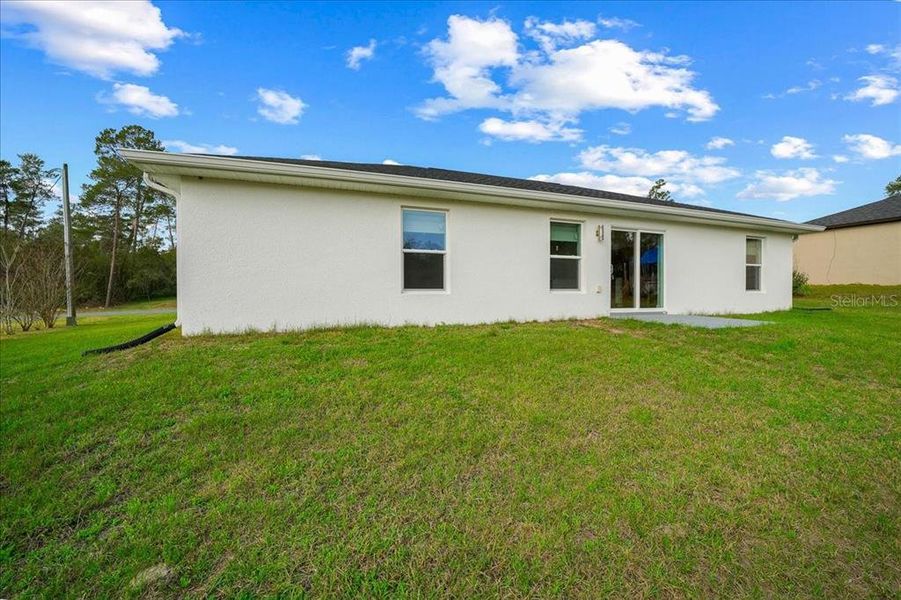 Exterior details and patio area of a home in , Ocala (Image 24).