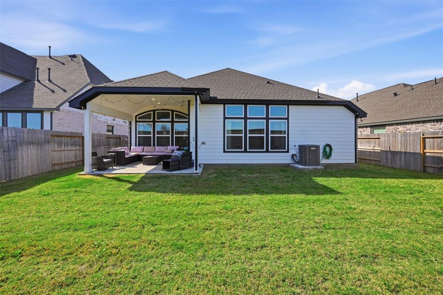 Exterior details and patio area of a home in Oakwood Estates, Waller (Image 18).