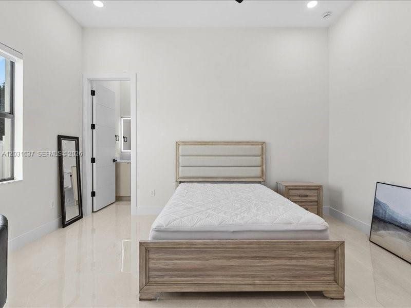 Furnished interior view inside a new home in , Port St. Lucie (Image 43).