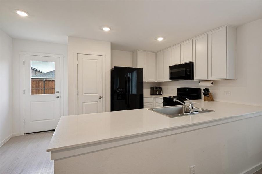 Furnished interior view inside a new home in , Little Elm (Image 14).