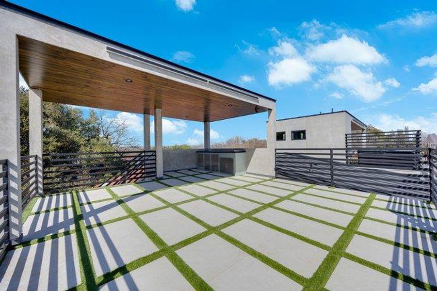 Private 3rd story rooftop deck with covered outdoor kitchen and views of downtown Austin, Hill Country and that morning sunrise.