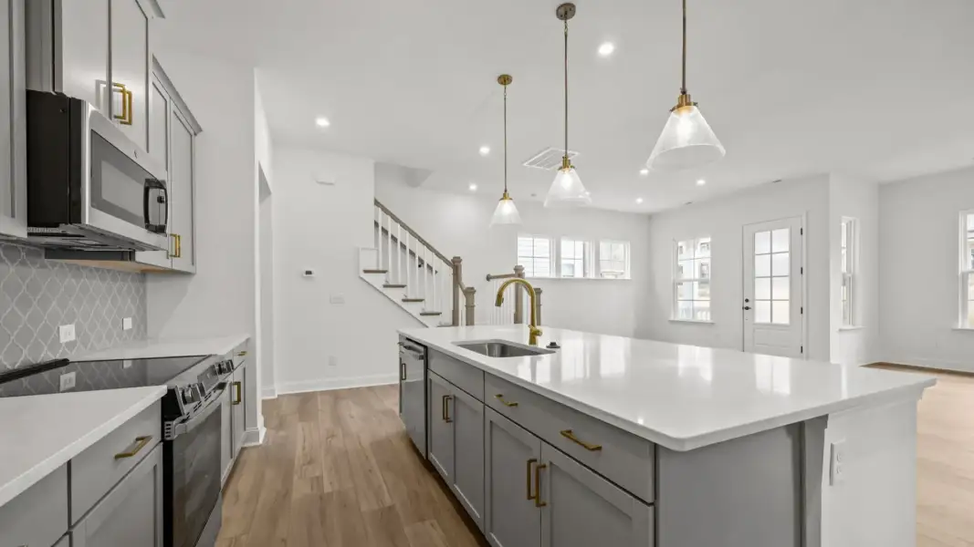 The Brentwood Plan by DRB Homes in River District, Charlotte NC.- Kitchen