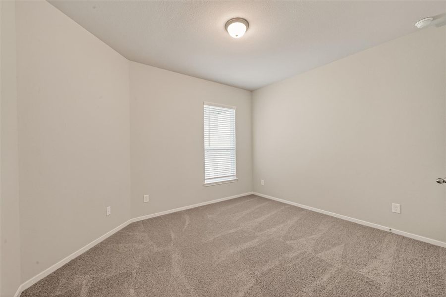 Spacious, unfurnished interior of a new home in Sunterra, Katy (Image 35).