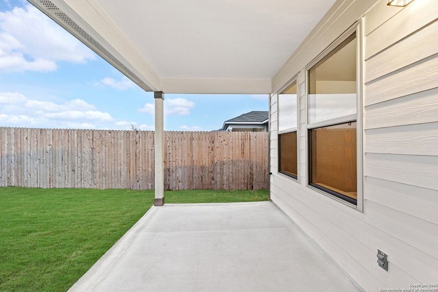 Exterior details and patio area of a home in Park Place, New Braunfels (Image 20).