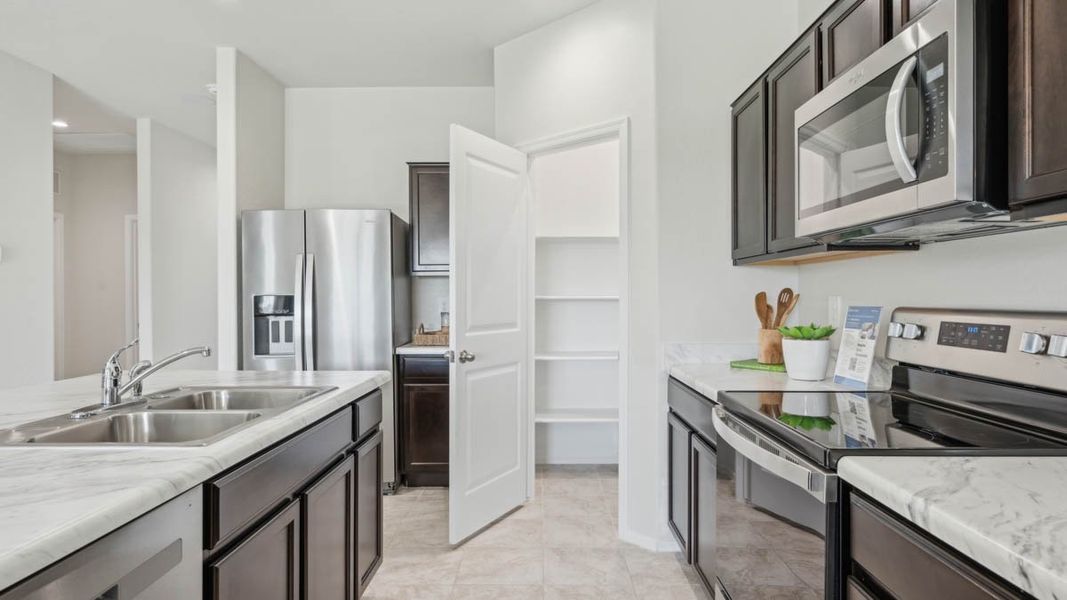 Furnished interior view inside a new home in Heartland Ranch, Coolidge (Image 10).