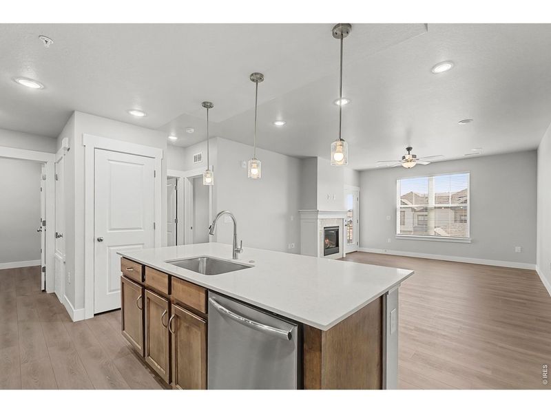 Furnished interior view inside a new home in Highlands at Fox Hill - The Flats, Longmont (Image 6).