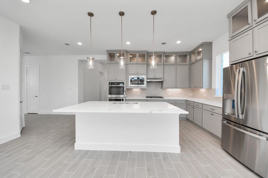 Furnished interior view inside a new home in Meridiana, Manvel (Image 16).