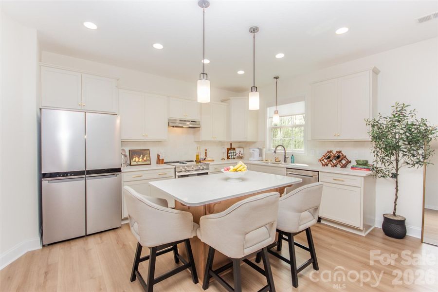 Furnished interior view inside a new home in , Statesville (Image 32).