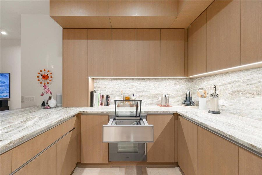 Built-in Gaggenau Vacuum Sealer reflects the home’s chef-forward layout and refined Rhode Partners design.