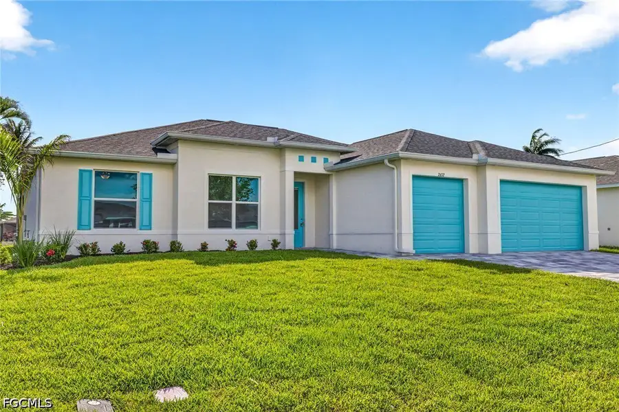 Front exterior of a new home in Cape Coral, Cape Coral, FL, highlighting curb appeal (Image 1). Front exterior of a new home in Cape Coral, Cape Coral, FL, highlighting curb appeal (Image 1).