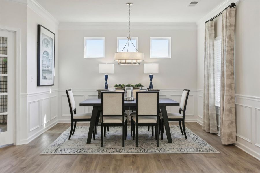 The Avondale- Dining Area. Sample image for illustration; upgrades, options, and colors may vary.