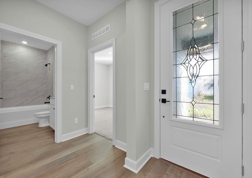 Be welcomed into the bright entry way