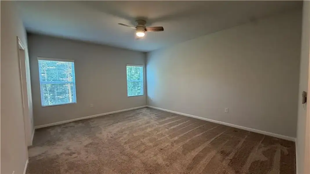 Spacious, unfurnished interior of a new home in Graystone Village, Grayson (Image 21).