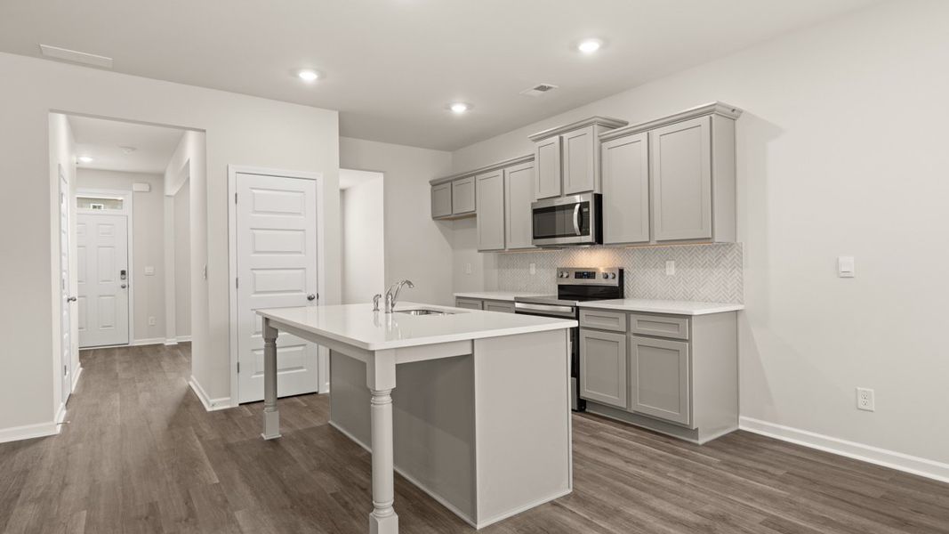 Representative furnished interior of a home built from the ANSLEY Express by D.R. Horton in WillowBrook, Winder (Image 8).